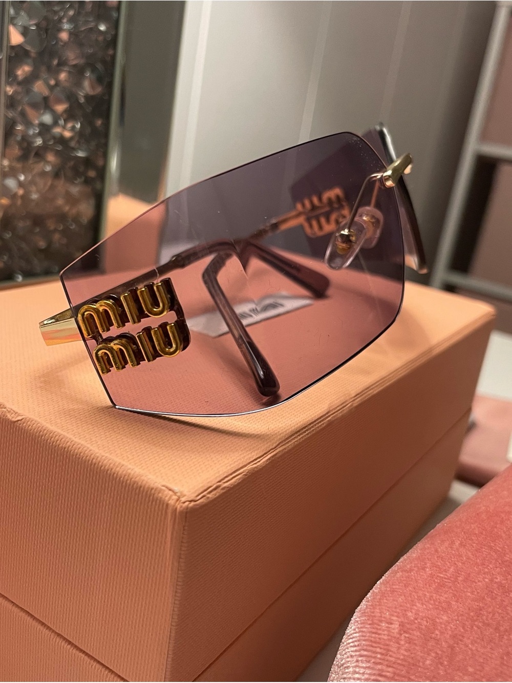 Miu Miu Rimless Rectangular Sunglasses in Rose Pink with Gold Accents - Picture 2 of 5